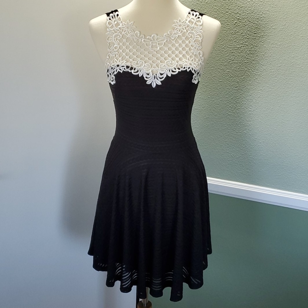 "OLIVE - TREE" SLEEVELESS FIT & FLARE DRESS.